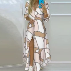 Jurken & Jumpsuits Dames*Antonia - Luxe Zomerjurk met Artistieke Kranten Print