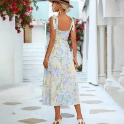 Jurken & Jumpsuits Dames*BRIA - Modieuze zomerse gebloemde midi-jurk