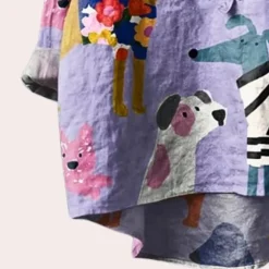 Topjes & Shirts Dames*Brynja - Zomershirt met speelse hondenprint voor dames Veelkleurig