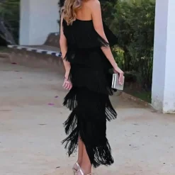 Jurken & Jumpsuits Dames*Carol - Modieuze één-schouder zomerjurk met kwastjes