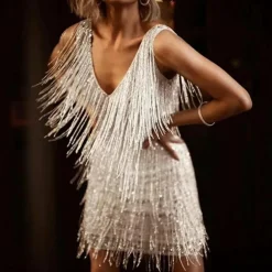 Jurken & Jumpsuits Dames*GRACE - Elegante zomerse mini jurk met kwastjes