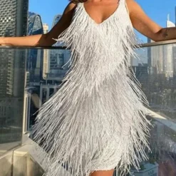 Jurken & Jumpsuits Dames*GRACE - Elegante zomerse mini jurk met kwastjes