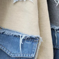 Truien & Vesten Dames*Hadria - Stijlvol gebreid damesvest met denimaccenten voor de zomer