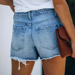 Broeken & Rokken Dames*Hildegard - Modieuze asymmetrische denim shorts voor dames - Zomerse stijl Blauw