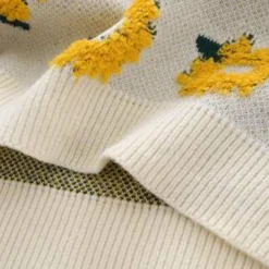 Truien & Vesten Dames*ILARIA - Luchtige gebreide trui met zonnebloempatroon voor de zomer