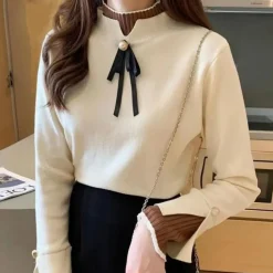 Truien & Vesten Dames*Inna - Zomerse halve col dames trui met strik