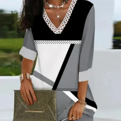 Jurken & Jumpsuits Dames*Ksenia - V-Hals Zomerjurk met Kanten Afwerking en Driekwart Mouwen Grijs