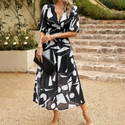 Jurken & Jumpsuits Dames*LAINEY - Elegante v-hals midi zomerjurk