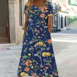 Jurken & Jumpsuits Dames*MINA - Casual bloemenjurk voor de zomer