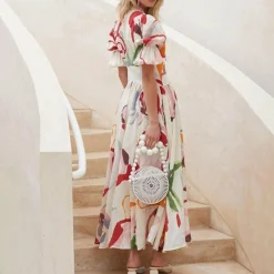 Jurken & Jumpsuits Dames*NYOMI - Modieuze zomerjurk voor zonnige dagen