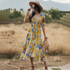 Jurken & Jumpsuits Dames*RAINA - Bloemen zomerjurk voor zonnige dagen