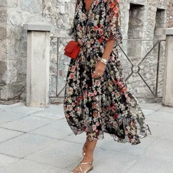 Jurken & Jumpsuits Dames*Regina - Bloemige zomerjurk voor zonnige dagen Zwart