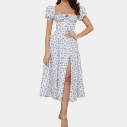 Jurken & Jumpsuits Dames*Sylvie - Zomerse gebloemde damesjurk met split