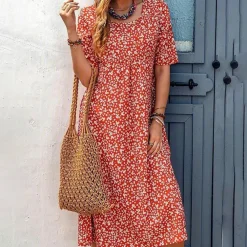 Jurken & Jumpsuits Dames*VEGA - Zomerse casual bloemenjurk