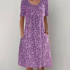 Jurken & Jumpsuits Dames*VEGA - Zomerse casual bloemenjurk