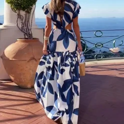 Jurken & Jumpsuits Dames*Yana - Stijlvolle Zomerjurk met Elegante V-halslijn Blauw